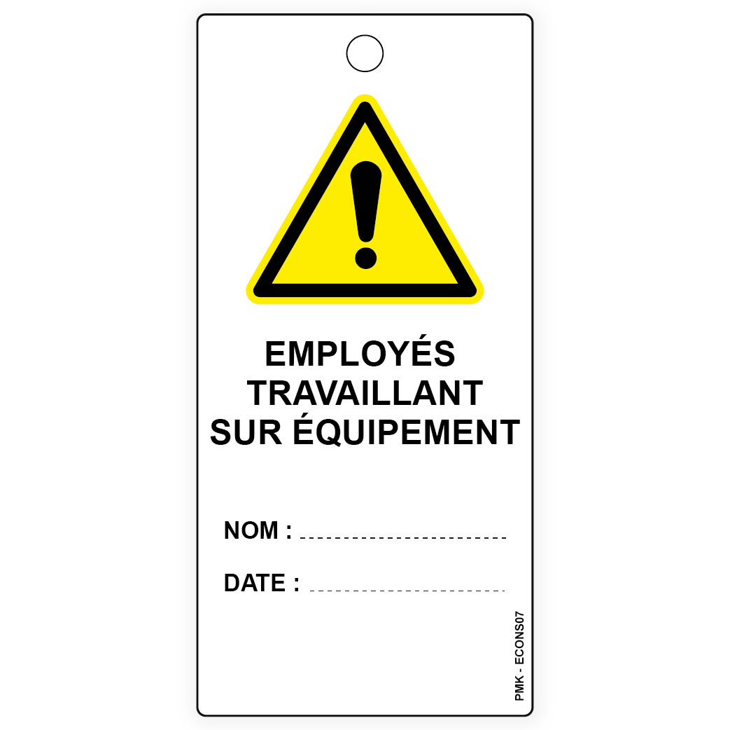 Employés travaillant sur équipement